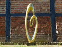 Large abstract sculpture IX - alu brass - on granite base