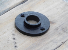 Door handle rosette made of iron, black.