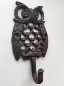 Wardrobe hook based on an owl, metal cast iron