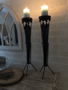 Set of beautiful standing metal castle torches with crown