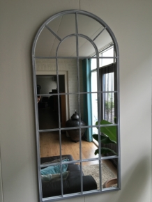 Large hefty mirror with metal frame, very nice in shape.