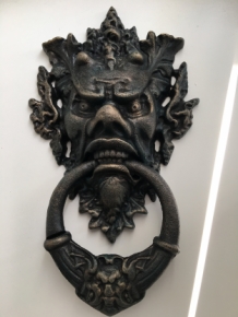 Cast iron door knocker with devil's head, very distinctive and beautiful!