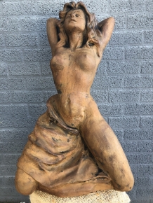 A beautiful statue of a naked woman, completely cast iron rust oxide, beautiful in detail!