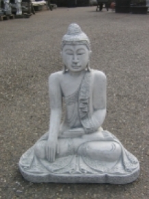 Buddha mit Handbewegung in Richtung Erde, voll mit Stein