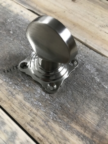 Nickel twist lock for toilet