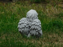 Angel sitting full of stone, beautiful in detail.