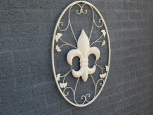 A large wrought iron wall ornament, the French Lily, antique-white