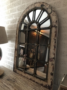 Large substantial stable window mirror, very nice in shape and robust in execution.