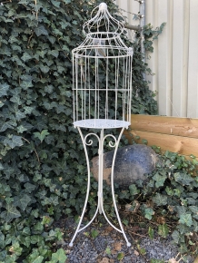 Large birdcage standing on graceful wrought iron legs, a piece of jewelry!!