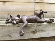 Sculpture lying cat from Polystein