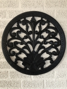 Wall ornament round, decoratively carved, black-brown, small