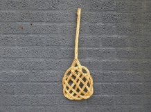 Old-fashioned carpet beater