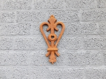 Wall anchor, cast iron, rust, heart shape.