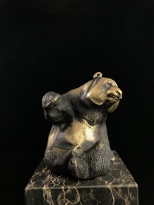 A bronze statue/sculpture of a sitting panda, on a beautiful large base!