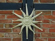 Wall ornament old-white sun, metal.