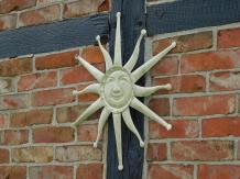 Wall ornament old-white sun, metal.