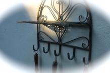 Wall shelf coat rack made of wrought iron