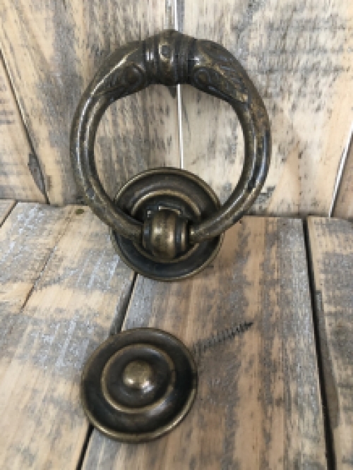 Door knocker, stylish and antique dark brass.