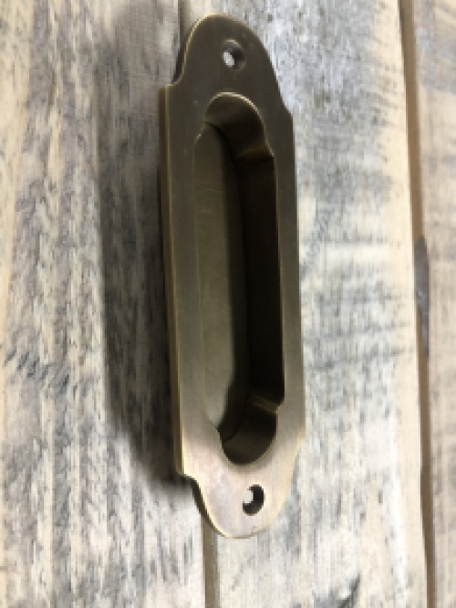 Sliding door handle - patinated brass - bowl handle