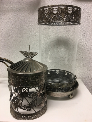 Beautiful metal lantern with separate rotating fire hood and cut glass.