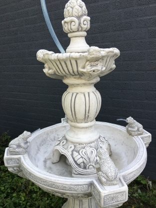 Garden fountain with spitting frogs - full stone