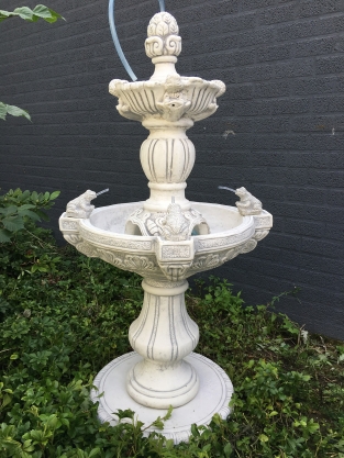 Garden fountain with spitting frogs - full stone