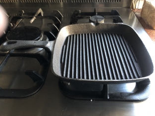 Heavy cast-iron grill pan, old-fashioned top quality.