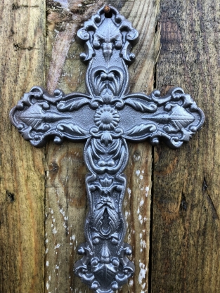 Cross made of cast iron, rusty