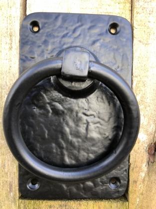 Rustic large ring as a door shutter/gate shutter-black coated metal.