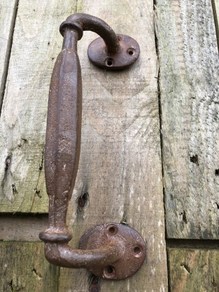 Door handle round-base made of solid iron - large- rust brown coated.