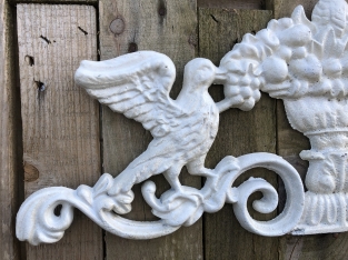 Wall ornament cast iron pigeon, old white-rust.