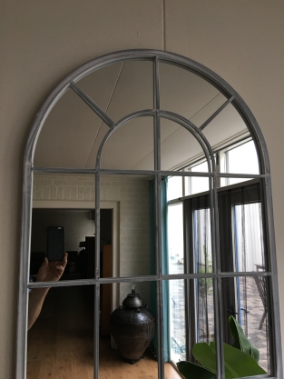 Large hefty mirror with metal frame, very nice in shape.