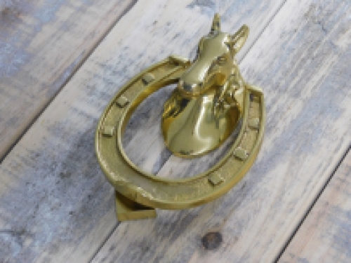 Door knocker horse head on horseshoe, brass gloss.