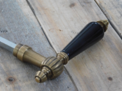 1 Door handle with ceramic handle black, brass patinated