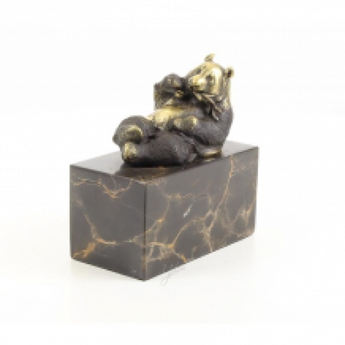 A bronze statue/sculpture of an eating panda