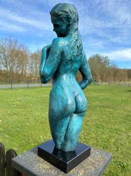 Elegant blue bronze statue of a nude woman on marble base