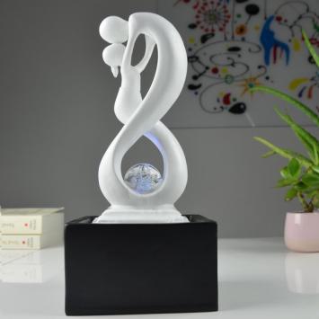 Indoor fountain, abstract sculpture with water ornament