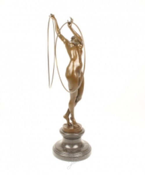 A bronze statue/sculpture of a naked hula hoop dancer