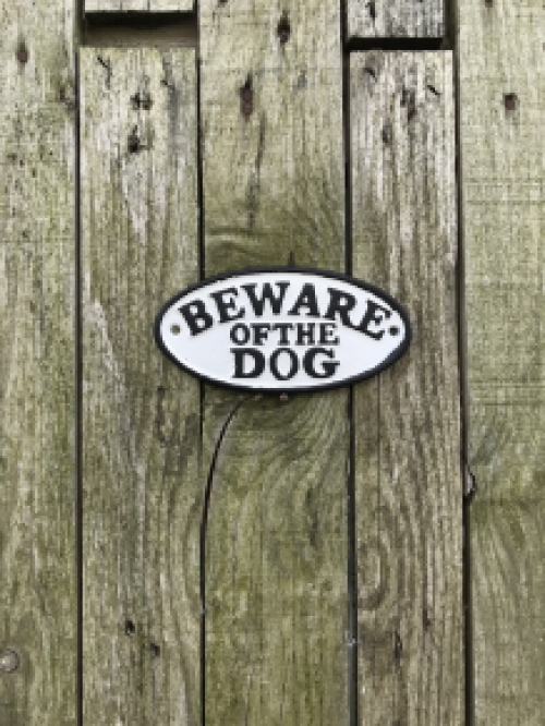 A cast iron sign with the text: ''BEWARE OF THE DOG'', nice bold letters!