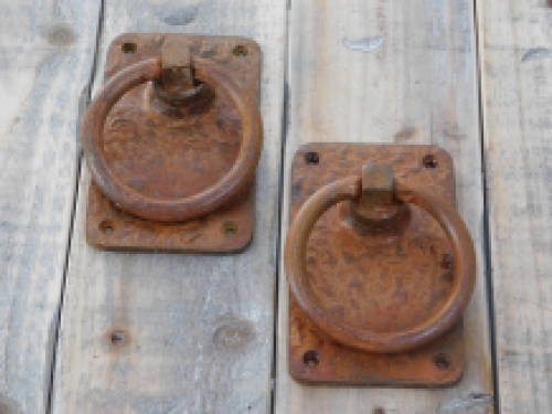 Rustic large rust colored rings as a door shutter/gate shutter set, beautifully nostalgic.
