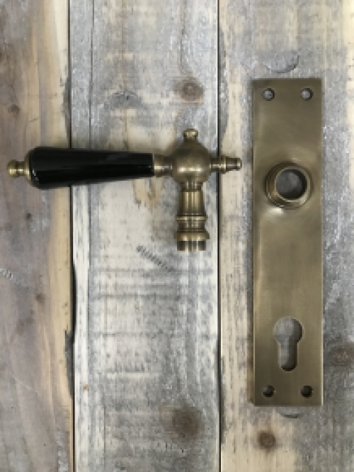 Door hardware set - brass patinated door plates and levers with ceramic handles