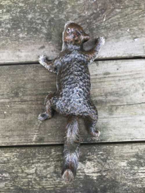 A climbing squirrel, coat rack-made of cast iron, wall decoration