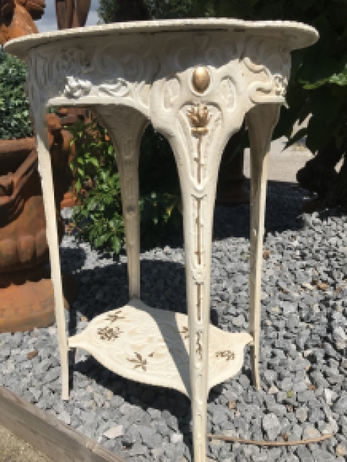 A cast iron table, white, art nouveau ''flower''