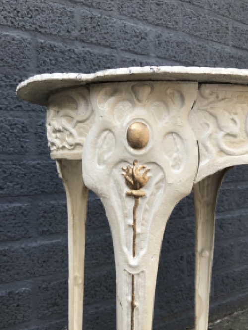 A cast iron table, white, art nouveau ''flower''