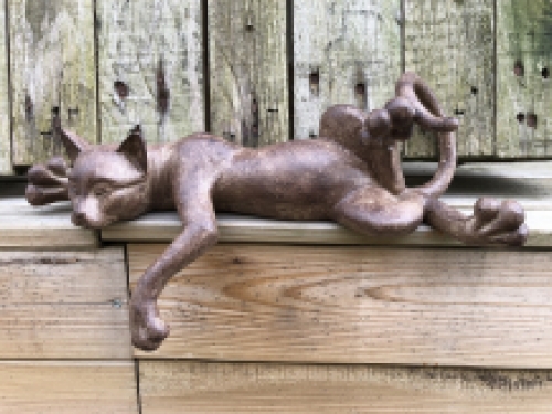 Sculpture lying cat from Polystein