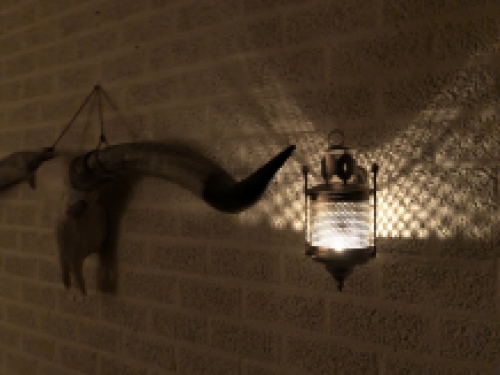 Wall lantern metal gray, perforation part to pass the light on the wall!