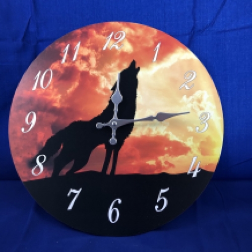 Wooden clock with image of a wolf.