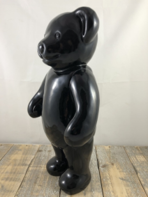 Beautiful black standing polystone bear.