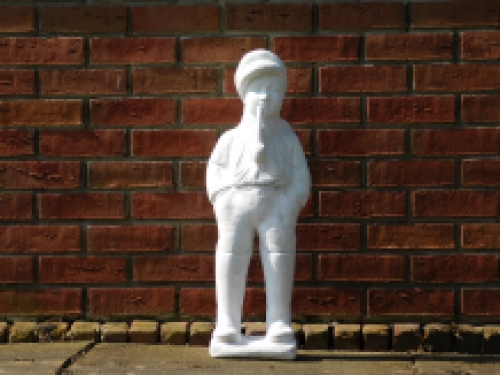 Statue boy with pipe - solid stone