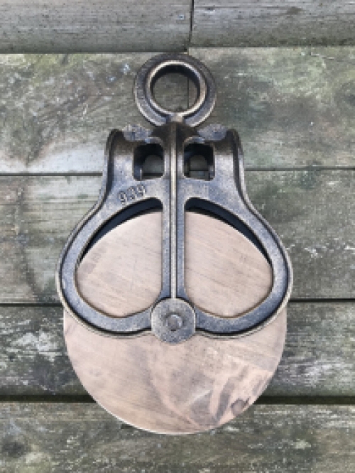 A beautiful pulley, cast iron pully, large